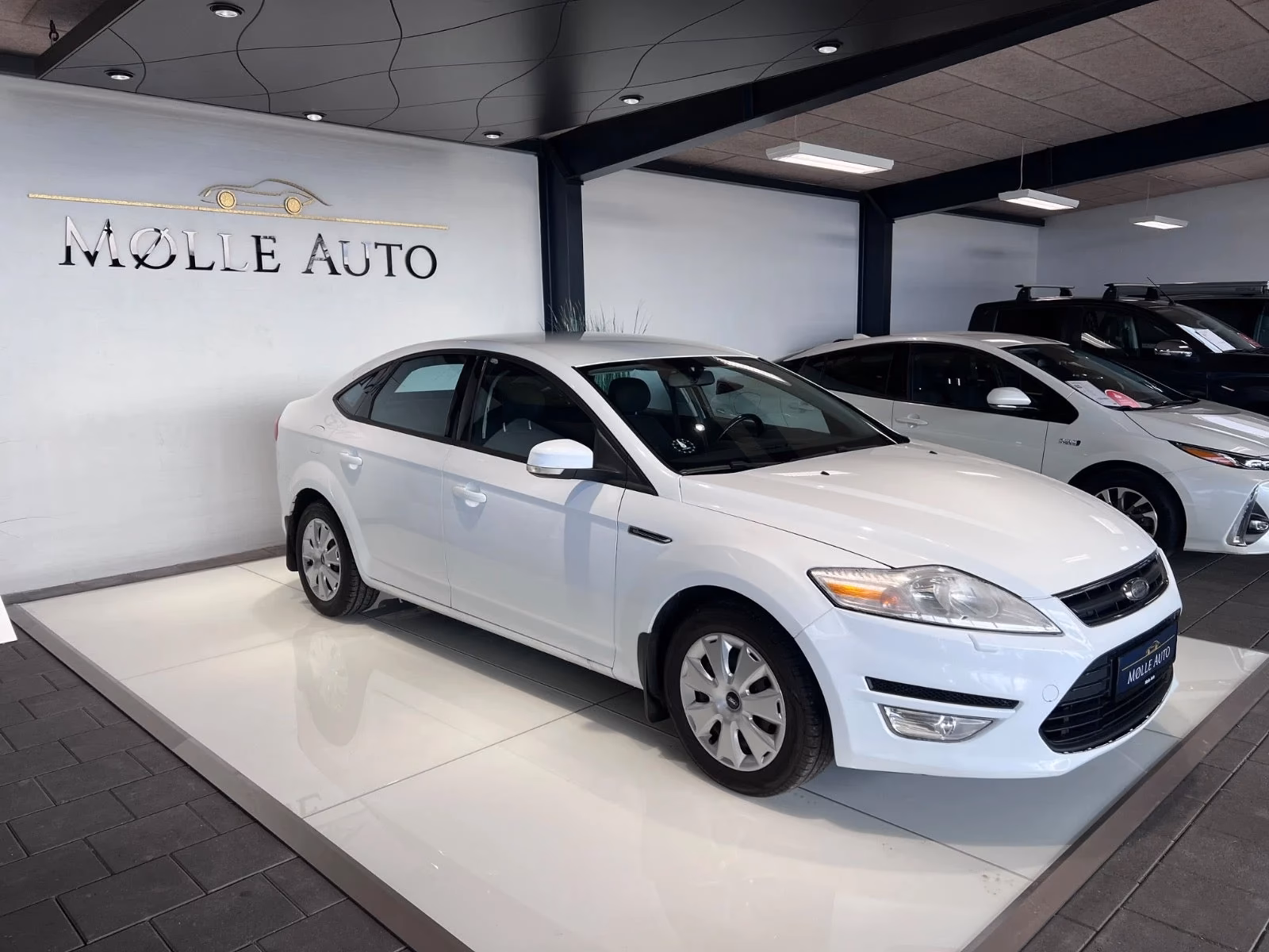 Ile spala Ford Mondeo na 100 km?